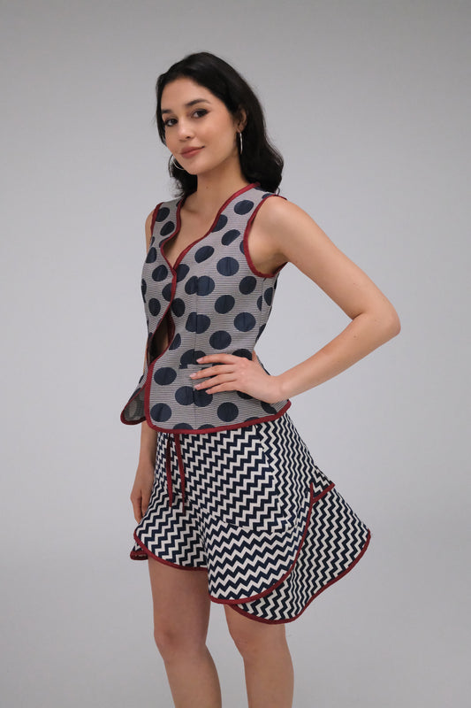 THE ZIGZAG ASYMMETRICAL MINI SKIRT WITH BURGUNDY TRIM
