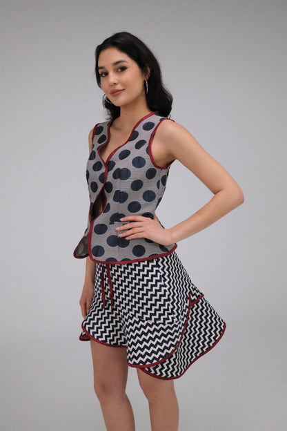 THE ZIGZAG ASYMMETRICAL MINI SKIRT WITH BURGUNDY TRIM