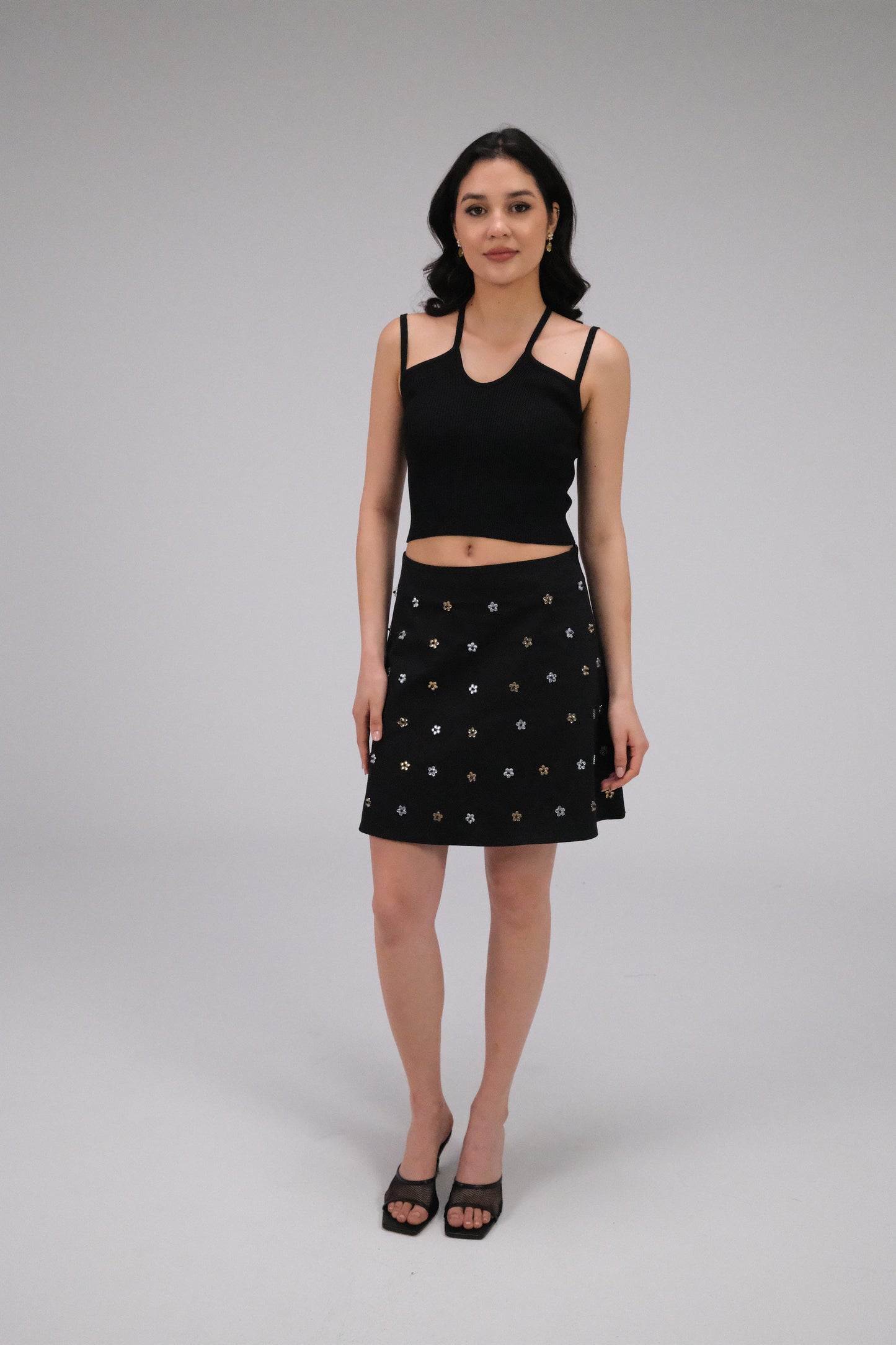 THE BLACK GABARDINE ALINE MINI SKIRT WITH FLOWER CRYSTALS