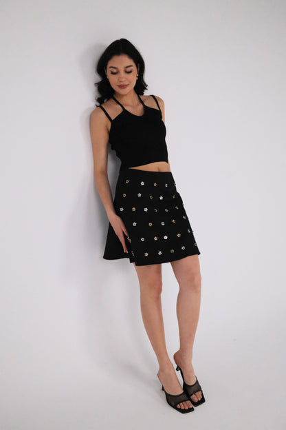 THE BLACK GABARDINE ALINE MINI SKIRT WITH FLOWER CRYSTALS