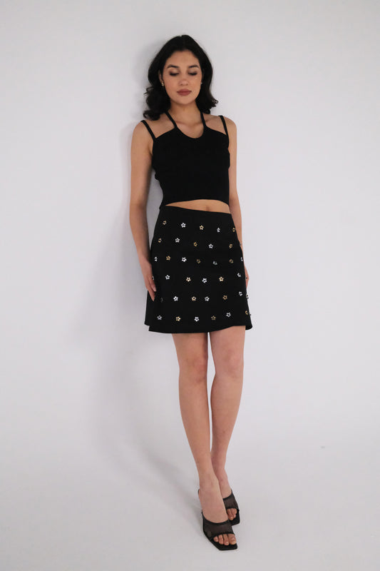 THE BLACK GABARDINE ALINE MINI SKIRT WITH FLOWER CRYSTALS