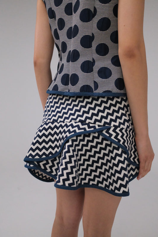 THE ZIGZAG ASYMMETRICAL MINI SKIRT WITH DENIM TRIM