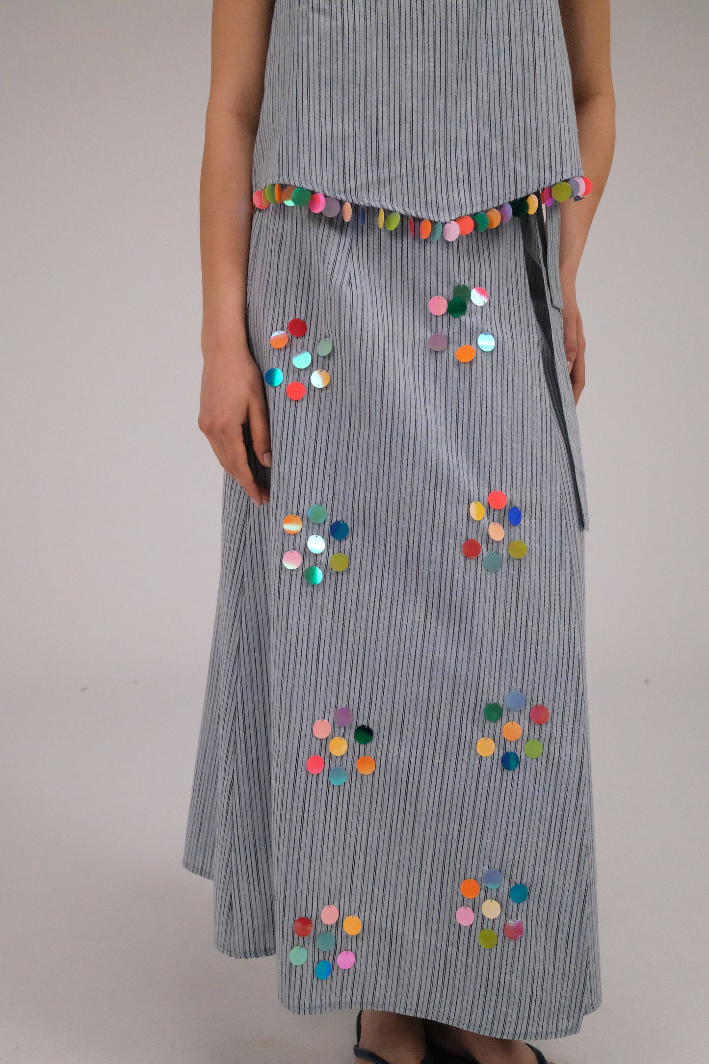 THE BLUE WRAP SKIRT WITH COINS