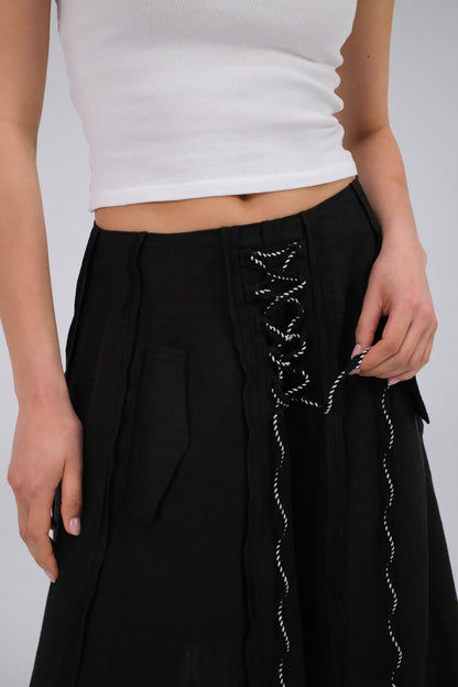 THE ASYMMETRICAL BLACK SKIRT