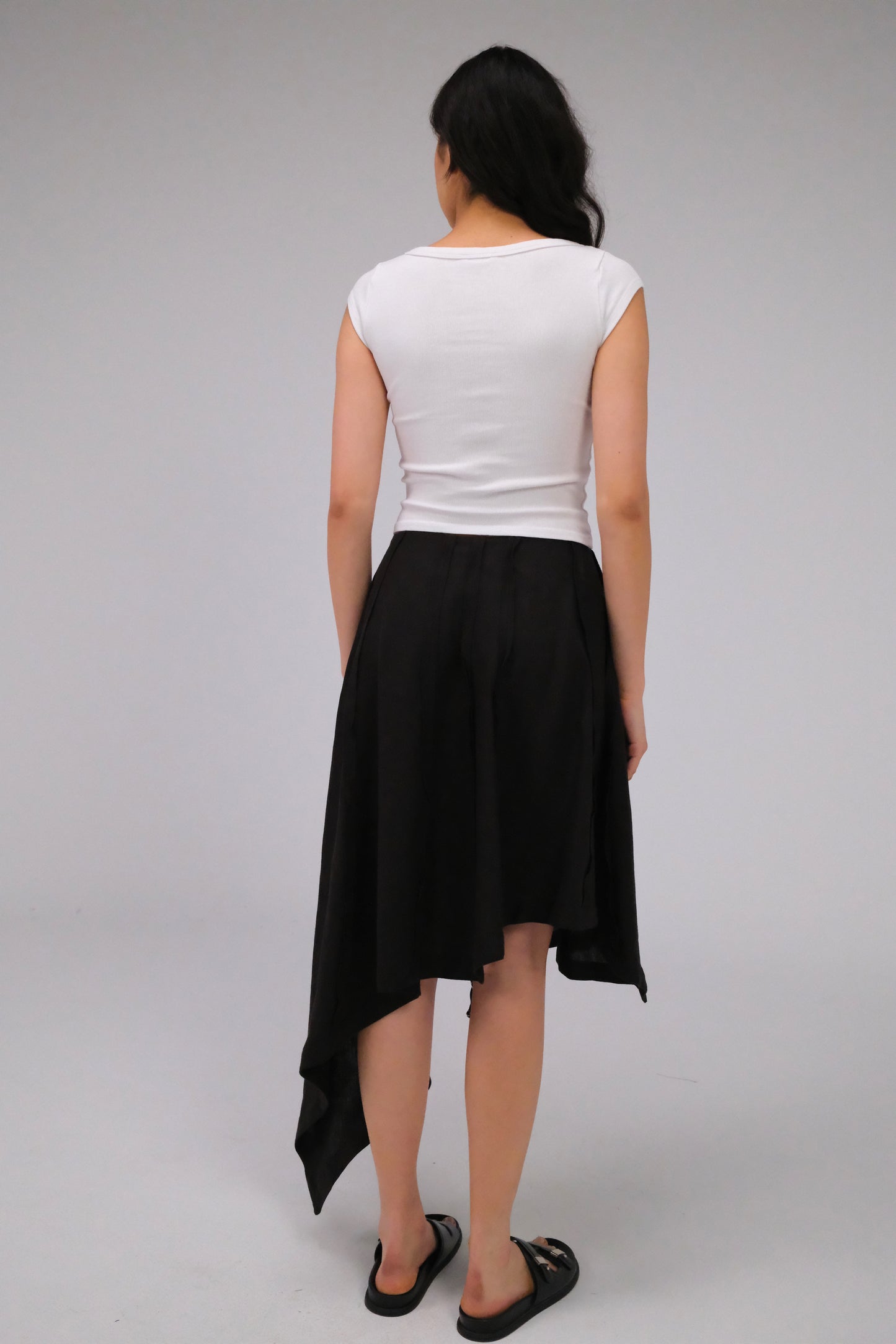 THE ASYMMETRICAL BLACK SKIRT