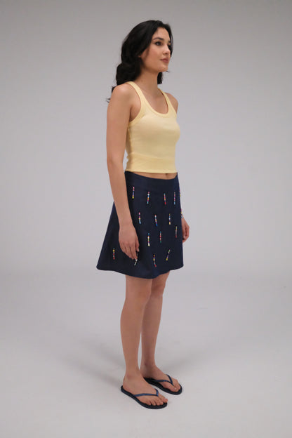 THE DENIM ALINE MINI SKIRT WITH DANGLING BEADS