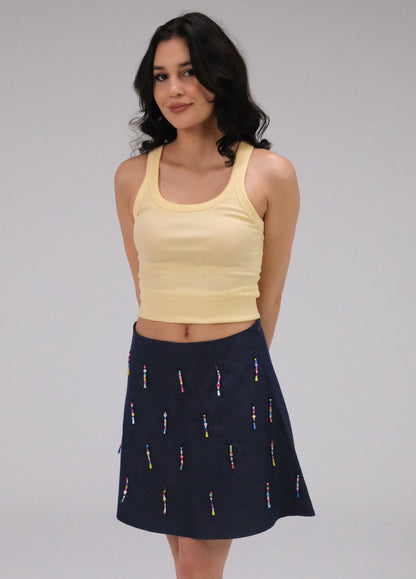 THE DENIM ALINE MINI SKIRT WITH DANGLING BEADS