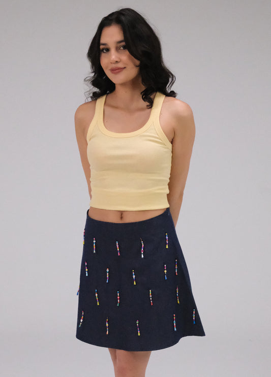 THE DENIM ALINE MINI SKIRT WITH DANGLING BEADS