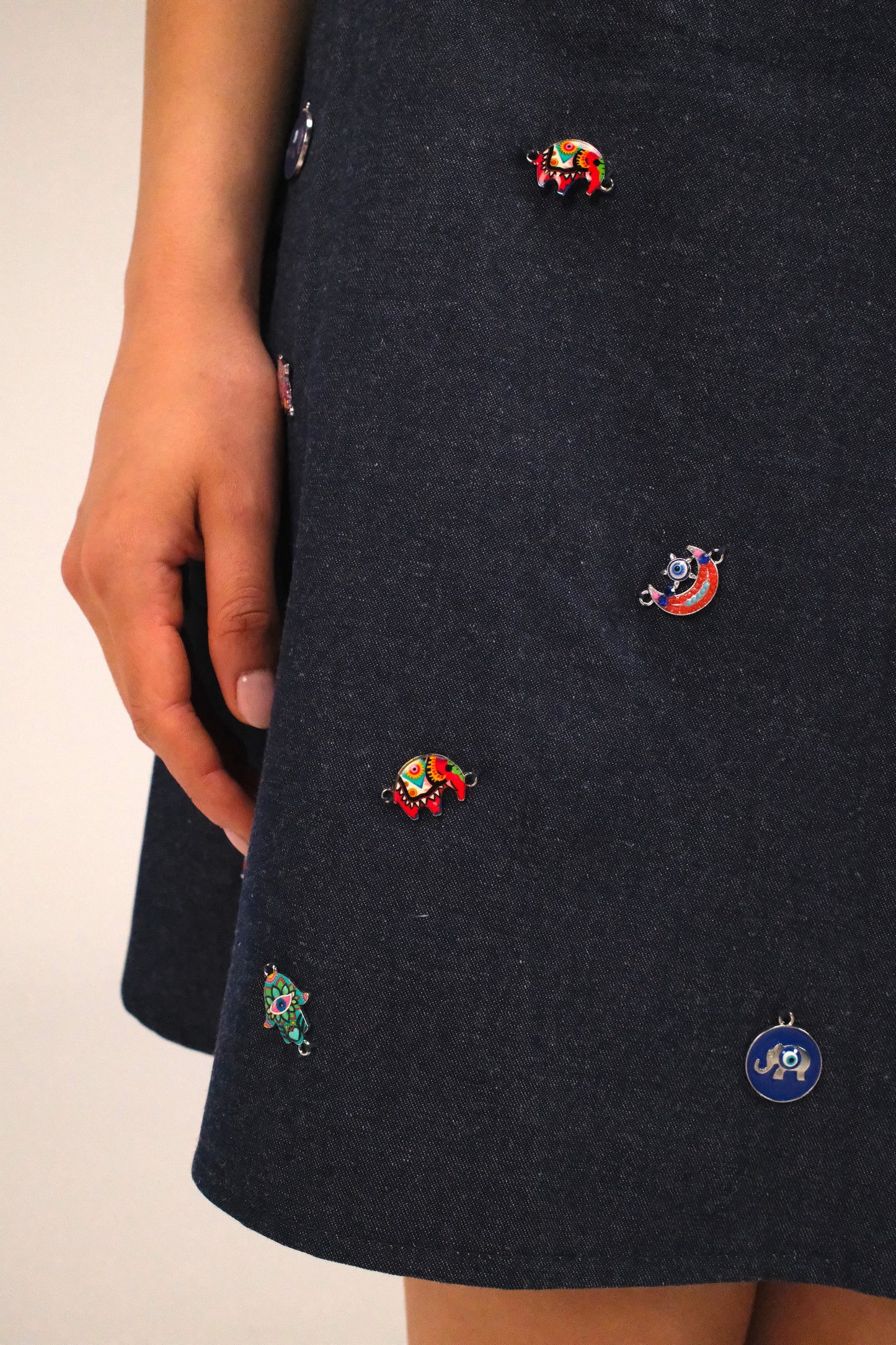 THE DENIM ALINE MINI SKIRT WITH PINS