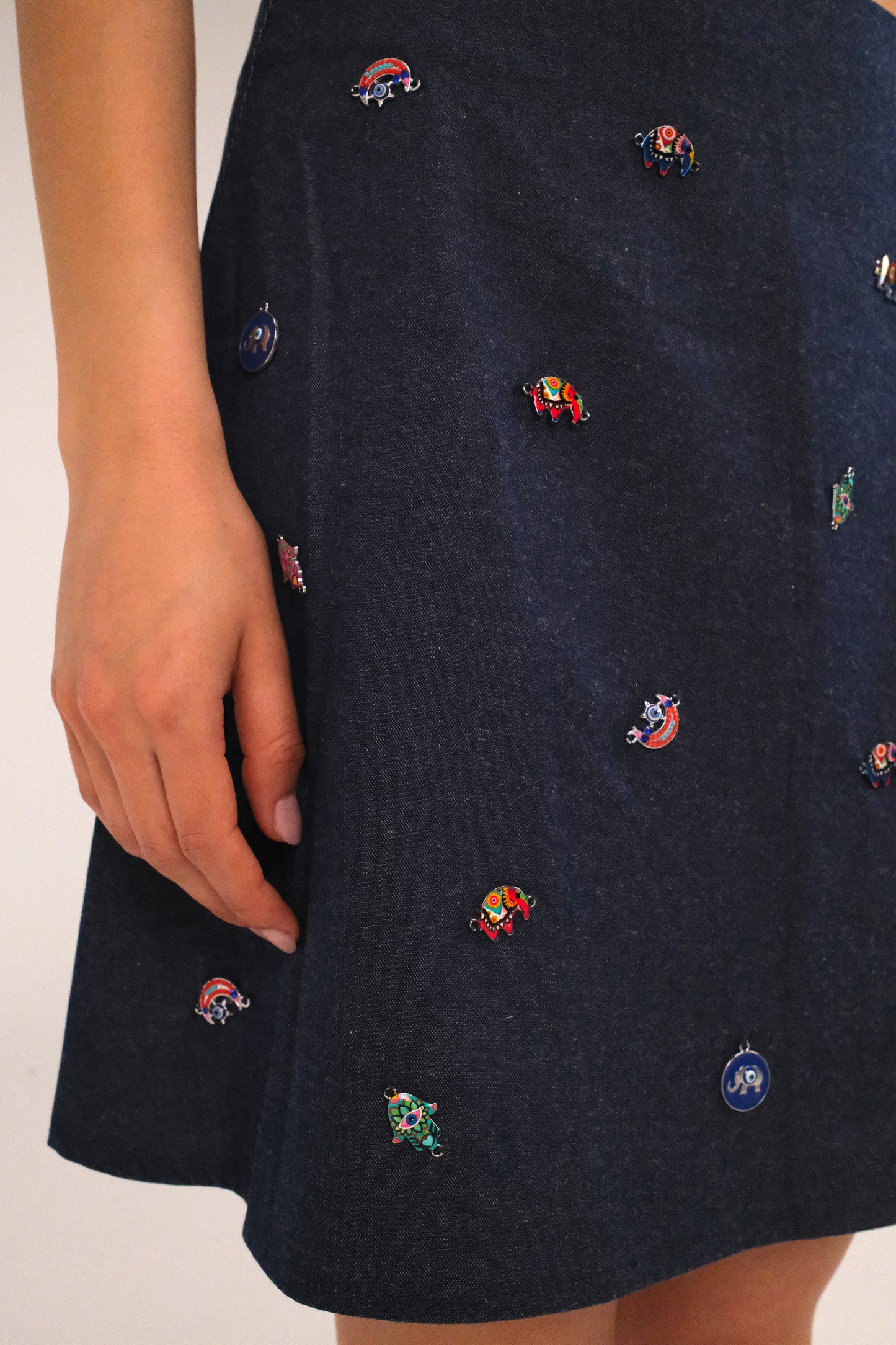 THE DENIM ALINE MINI SKIRT WITH PINS