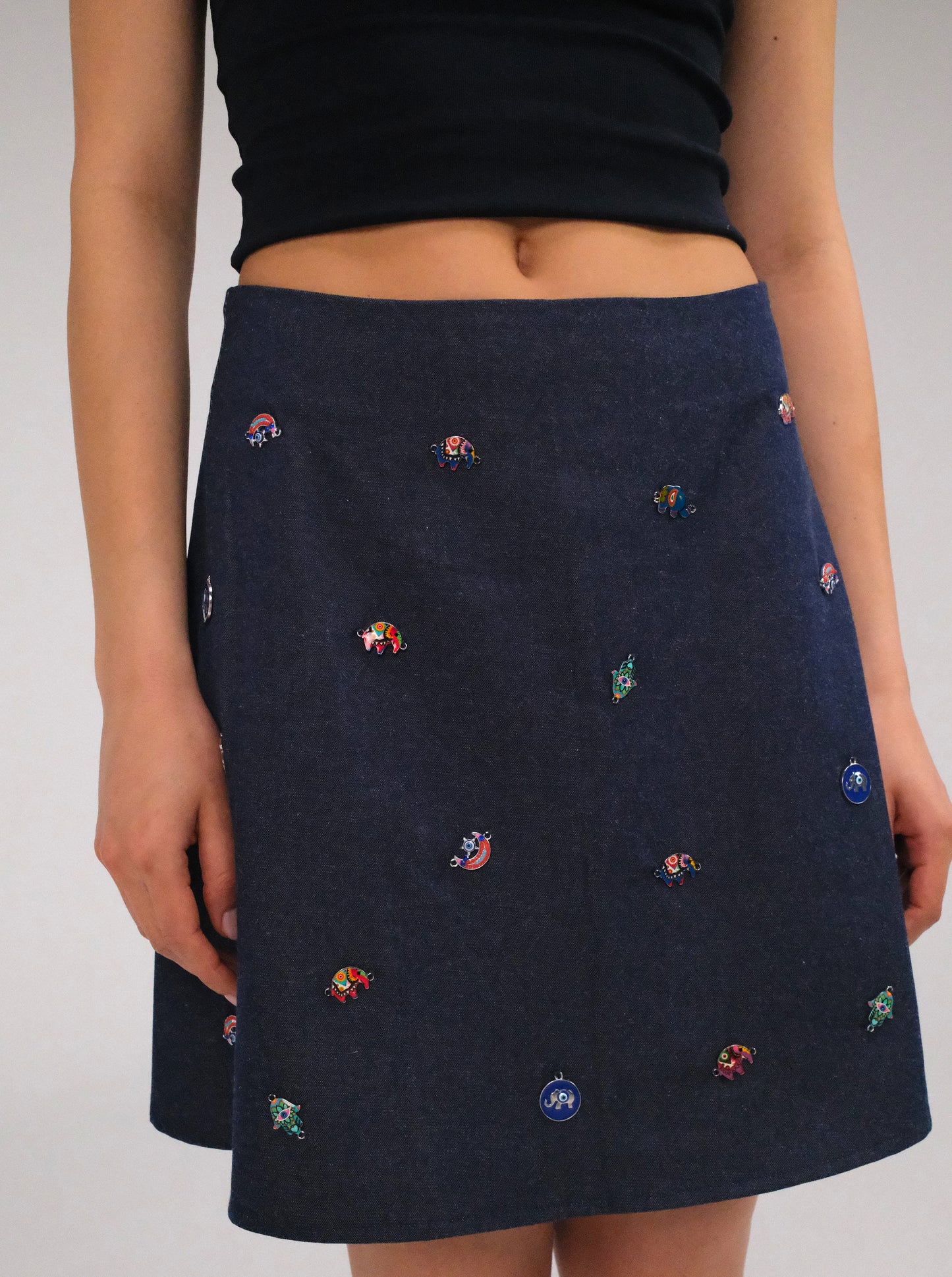 THE DENIM ALINE MINI SKIRT WITH PINS